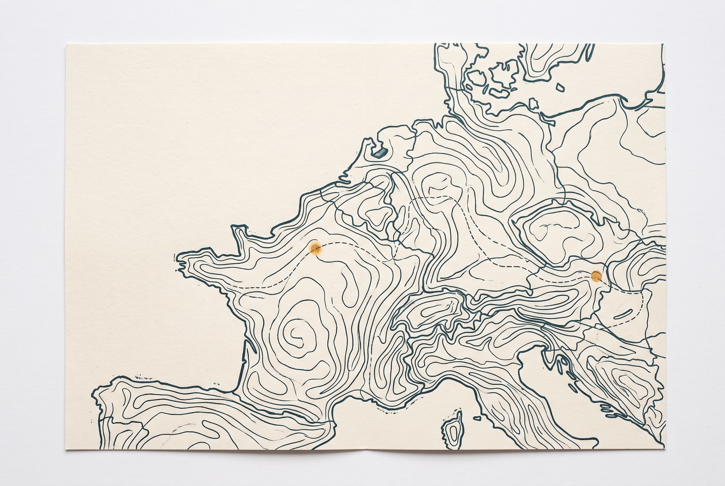 Map lines and a travel route on paper